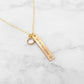 You Are My Sunshine personalized necklace with charm for mom or grandma on marble background.