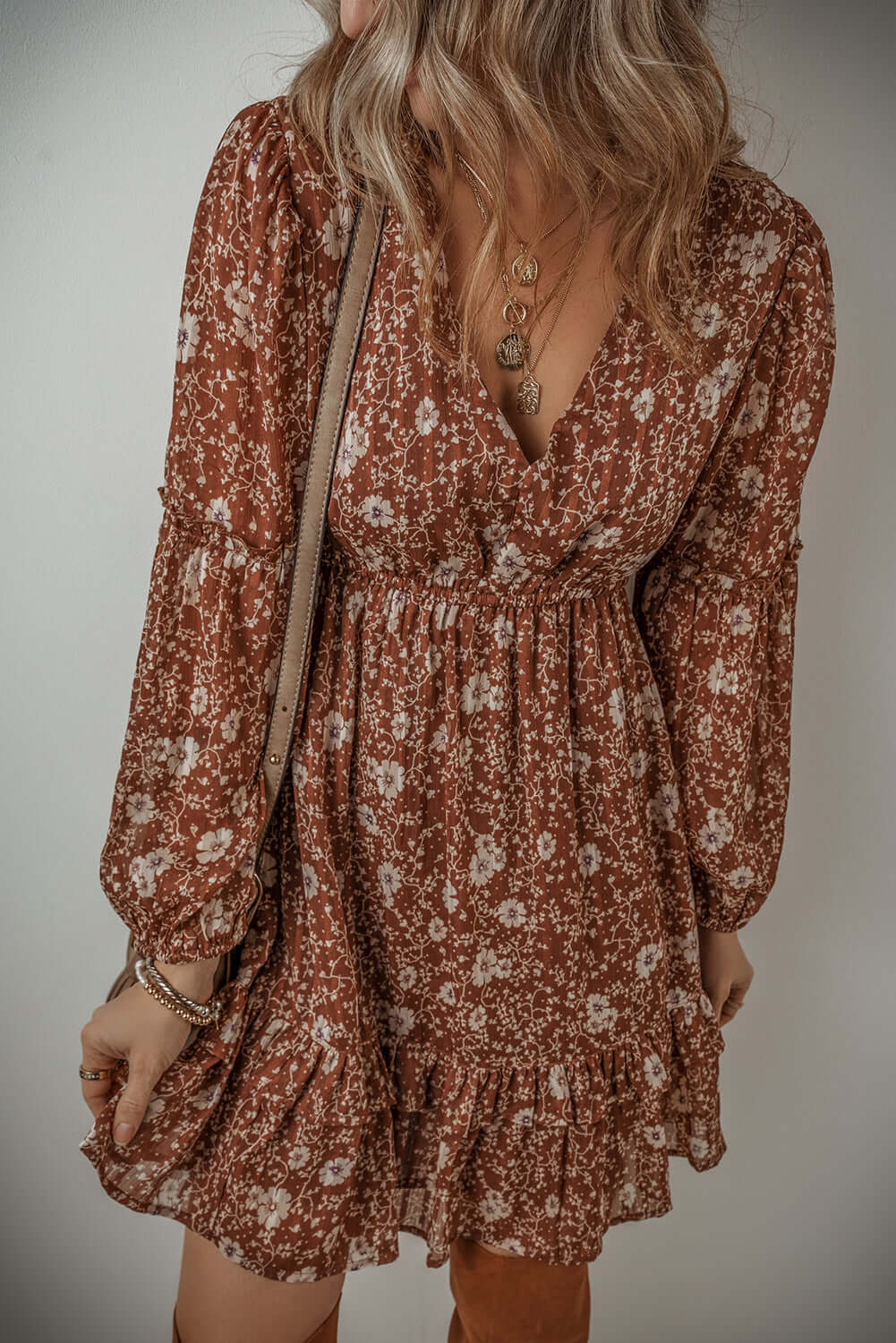 Ashley Boho Floral Puff Sleeve Mini Dress in warm brown with floral pattern and ruffled hem, perfect for a feminine look.