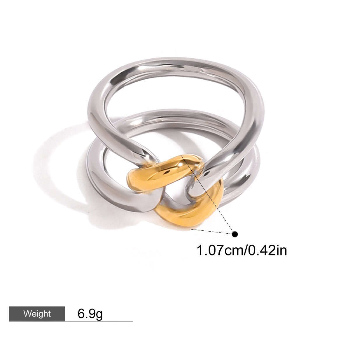 Elegant 18K gold-plated ring with hollow design and contrasting gold and silver bands, showcasing luxury fashion.