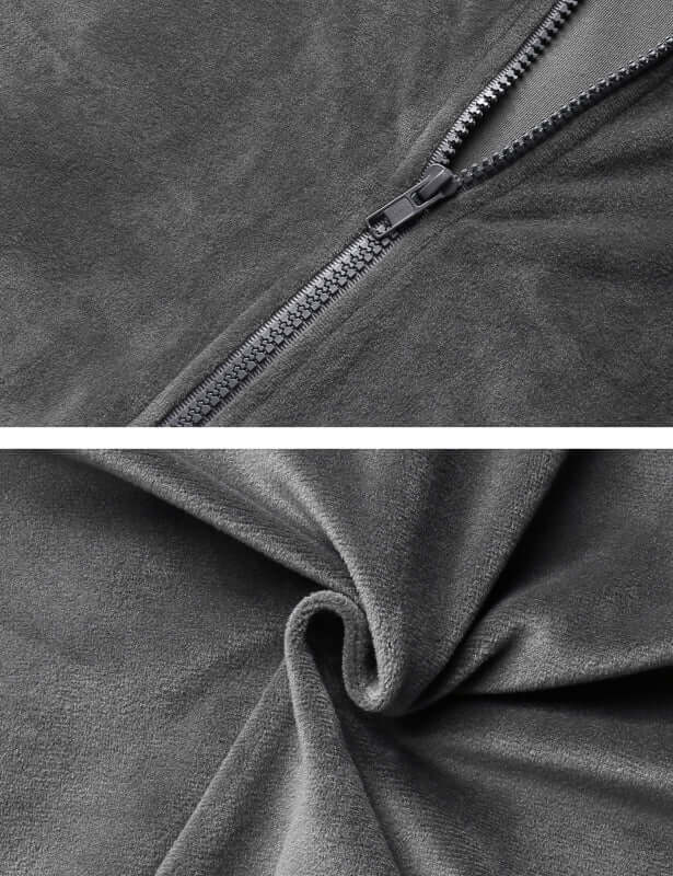 Close-up of soft gray fabric with zipper detailing, showcasing plush texture for a cozy knit two-piece set.