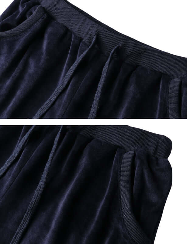 Close-up of navy blue knit pants featuring an elastic waistband and drawstring, ideal for cozy leisure wear.