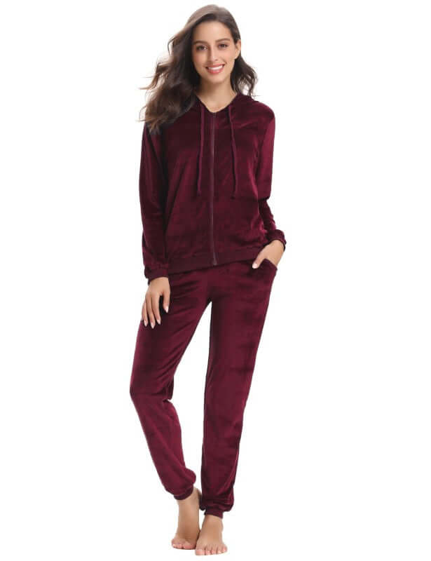 Women in cozy burgundy knit two-piece set, ideal for autumn and winter leisure wear.