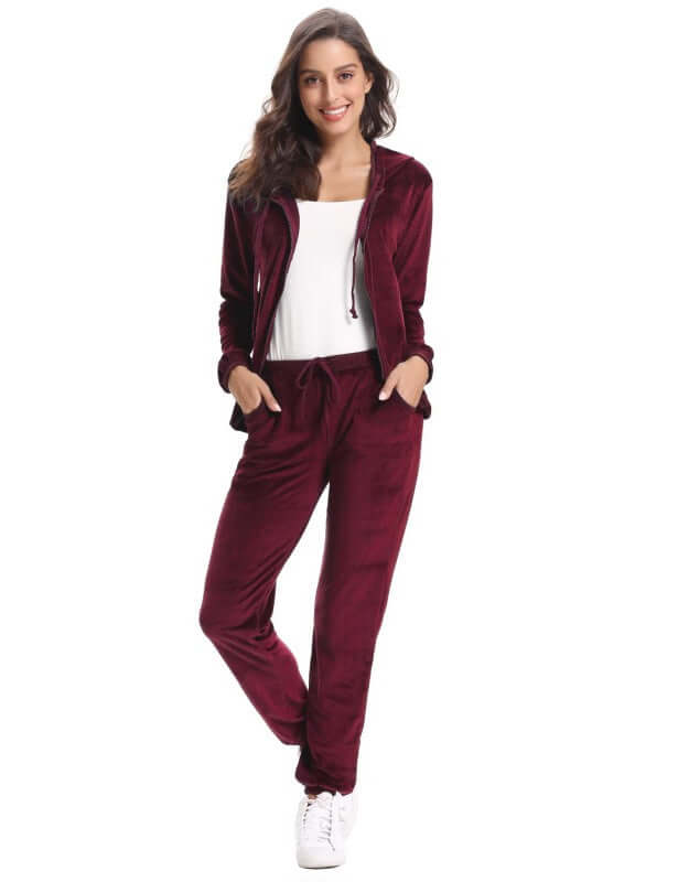 Women's cozy knit two-piece set in burgundy, perfect for autumn-winter leisure wear, featuring long sleeves and mid waist.