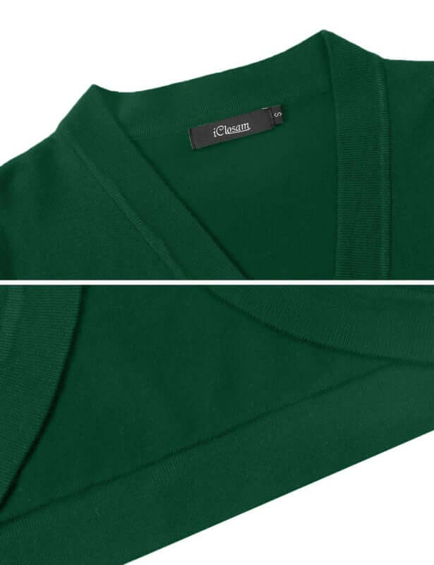 Close-up view of a green women's 3/4 sleeve cropped cardigan with a v-neckline and brand label.