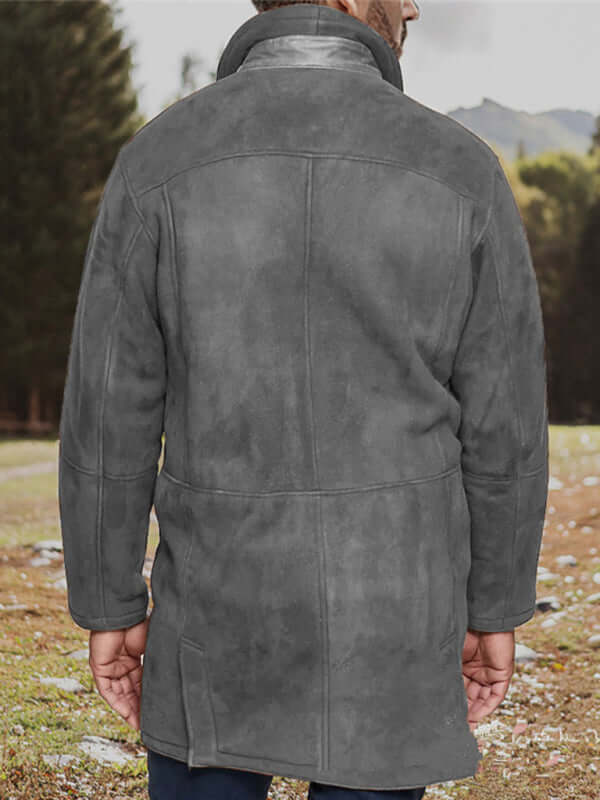 Men's mid-length loose gray zipper woolen coat back view in a forest setting.