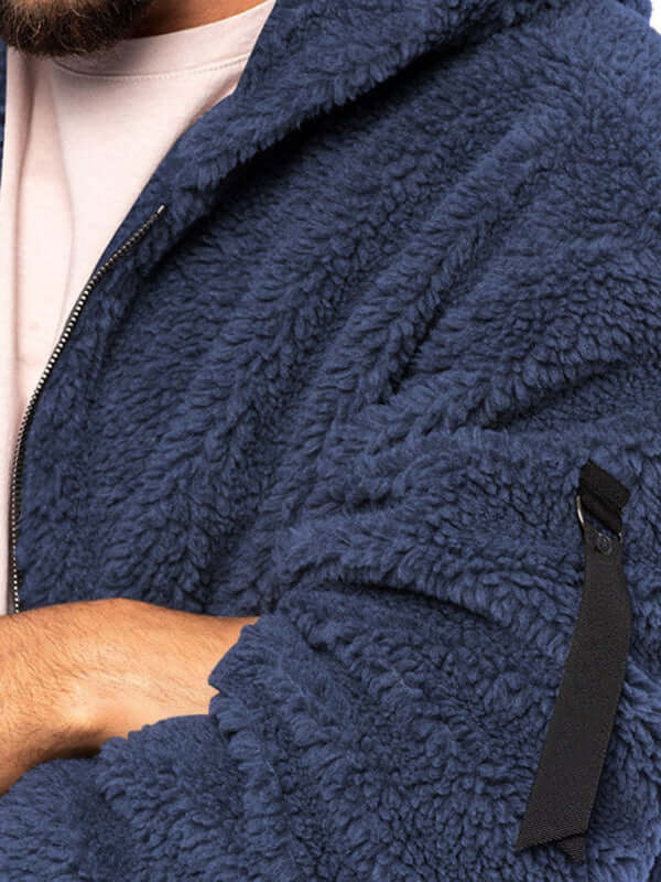 Men's warm, loose hooded casual jacket in navy blue, featuring a furry texture and slant pocket for a cozy look.