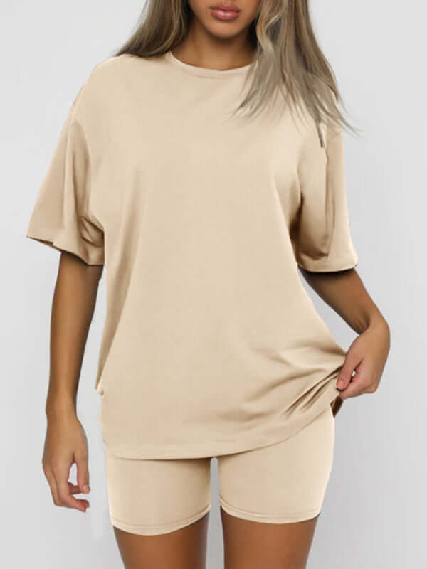 Women’s solid color casual short-sleeved top and shorts two-piece set in beige, perfect for spring-summer leisure wear.