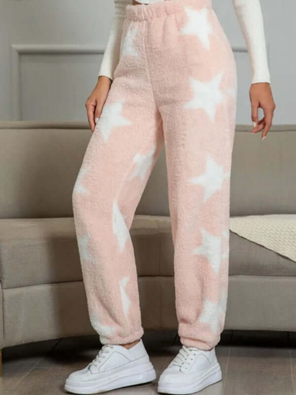 Cozy pink coral fleece pajamas with star pattern, perfect for autumn-winter lounging.