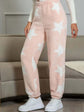 Cozy pink coral fleece pajamas with star pattern, perfect for autumn-winter lounging.