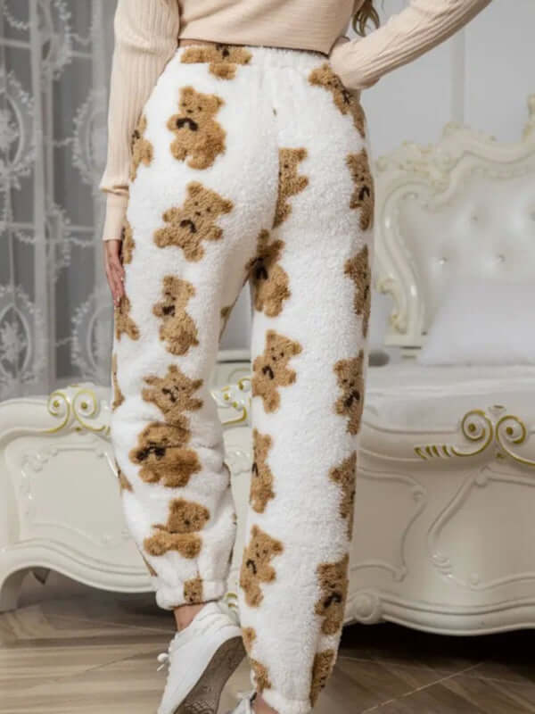 Cozy white coral fleece pajamas with teddy bear pattern, perfect for autumn and winter wear.