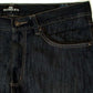 Close-up of 65 McMlxv men&