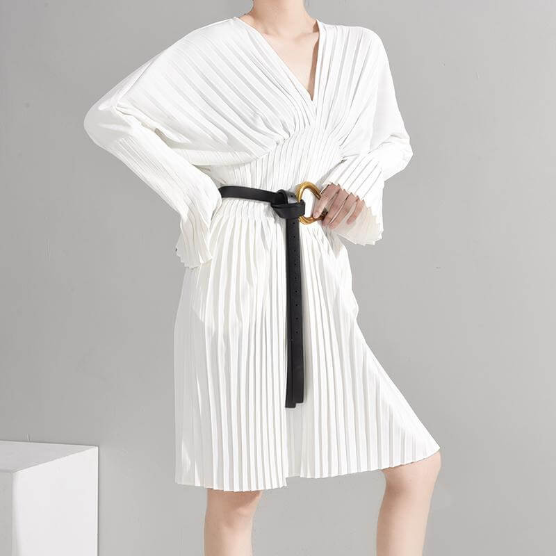 Sakiya Pleated Long Sleeve Shirt Dress in White with V-Neck and full sleeves, styled with a black belt.