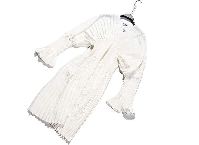 Sakiya pleated long sleeve shirt dress in white, knee-length, V-neck, made of cotton, perfect for casual wear.