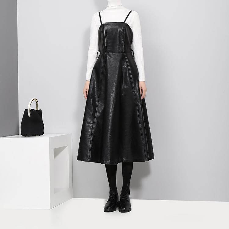 Musset Vegan Leather Dress in black, knee-length A-line silhouette with spaghetti straps and O-neck neckline.