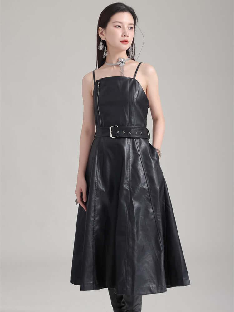 Musset Vegan Leather Dress in black, knee-length, A-line silhouette, spaghetti straps, sleeveless with natural waistline.