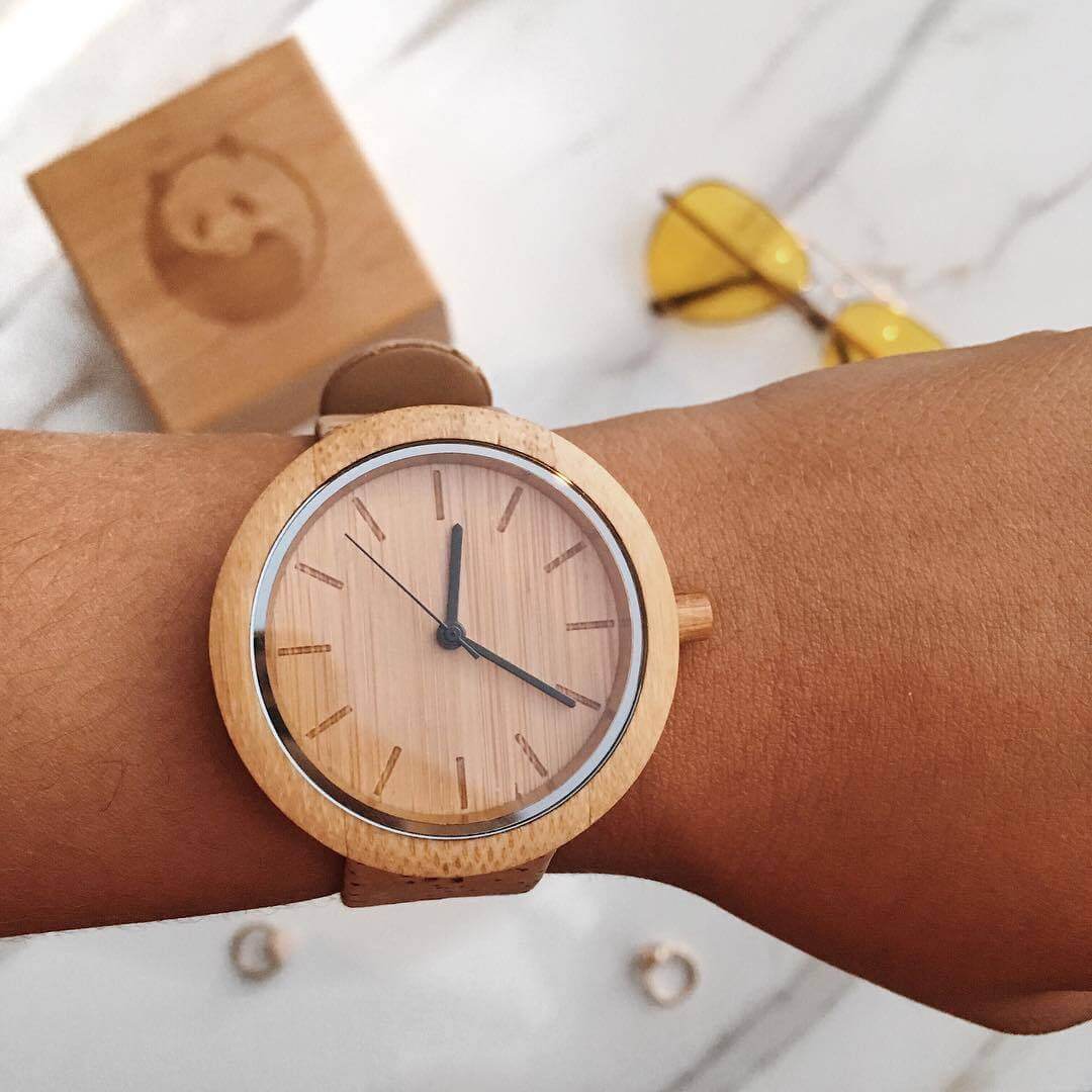 Handcrafted eco-friendly Panda Watch featuring bamboo design and minimalist style on a wrist.