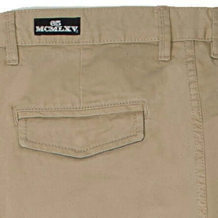 Close-up of 65 McMlxv men's khaki chino pant back pocket and waistband detail.