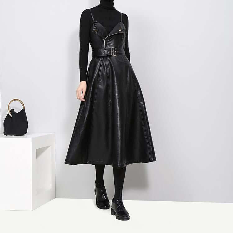 Knee-length Musset Vegan Leather dress in black, featuring A-line silhouette and spaghetti straps.