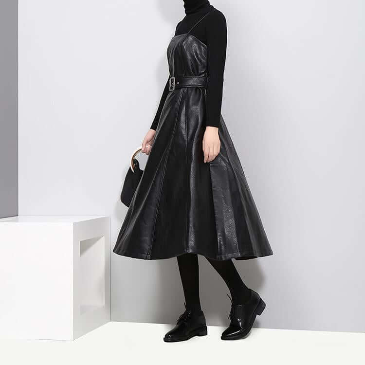 Musset Vegan Leather Dress in black, knee-length A-line silhouette with spaghetti straps and natural waistline.