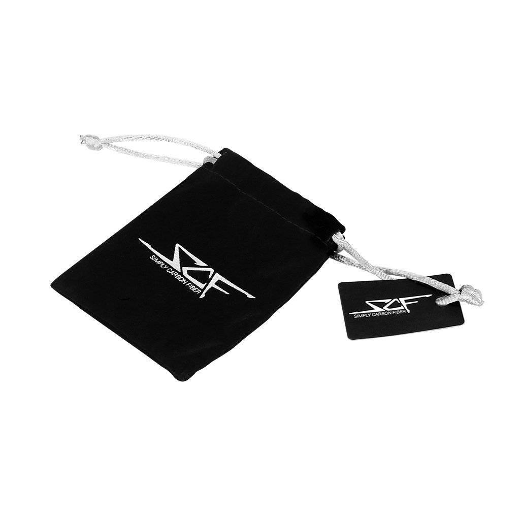 Black velvet gift bag with silver drawstring and logo tag for a carbon fiber ring.