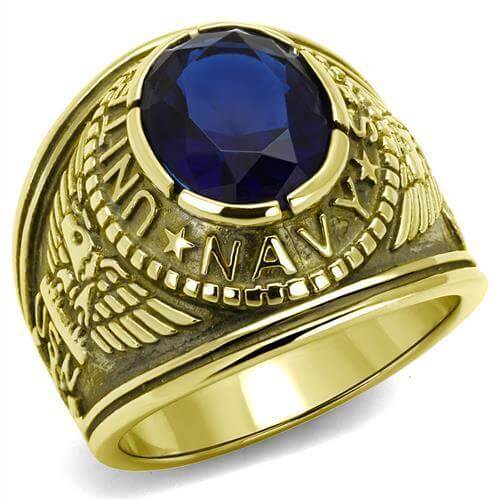 Gold military ring with navy insignia and blue synthetic glass center stone.